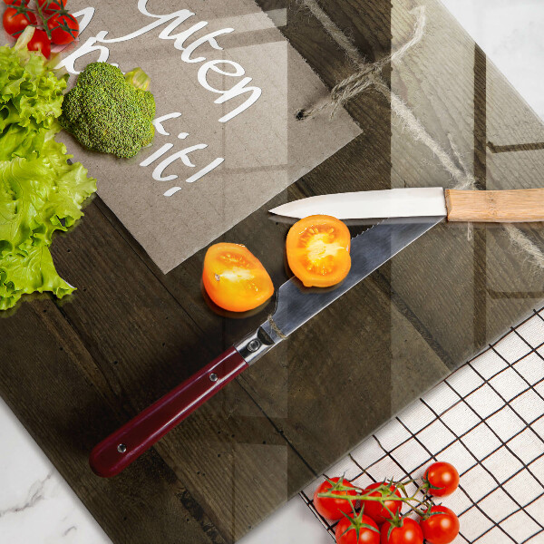 Kuchynská doska zo skla Nápis Guten Appetit na drevených doskách