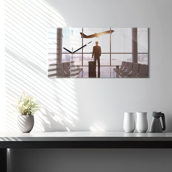 Horizontálne hodiny Muž na letisku