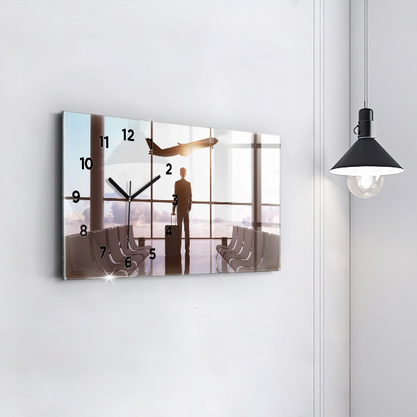 Horizontálne hodiny Muž na letisku