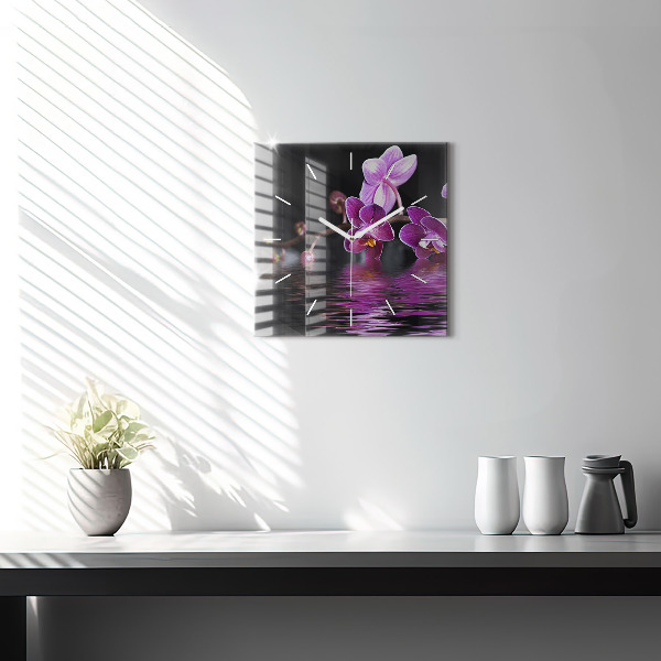 Štvorcové hodiny Kvet orchidey na vode