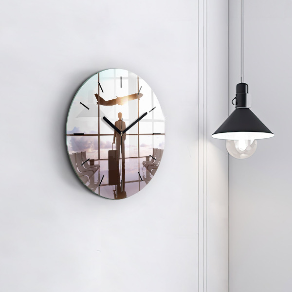 Okrúhle hodiny Muž na letisku