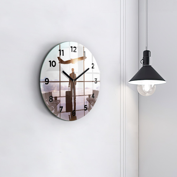 Okrúhle hodiny Muž na letisku