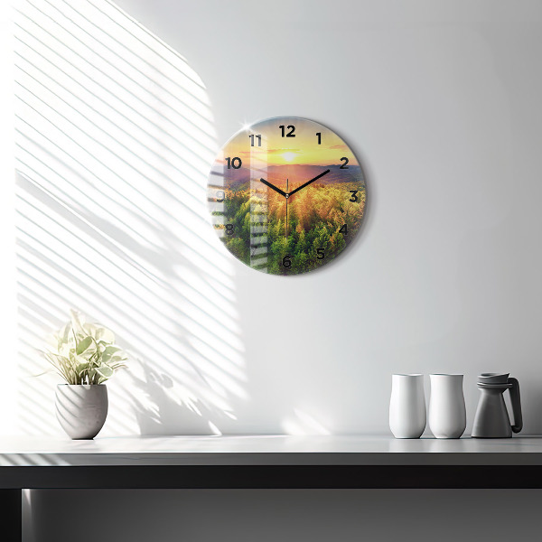 Okrúhle hodiny Západ slnka nad kopcami