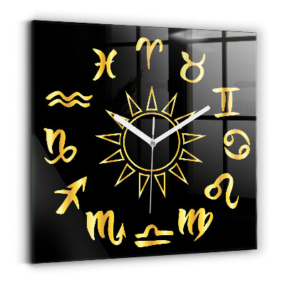 Štvorcové nástenné hodiny Zlaté astrologické znamenia na čiernom pozadí.